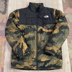 Reversible Camo North Face Boys Reversible Puffer Jacket with Fleece Lining.